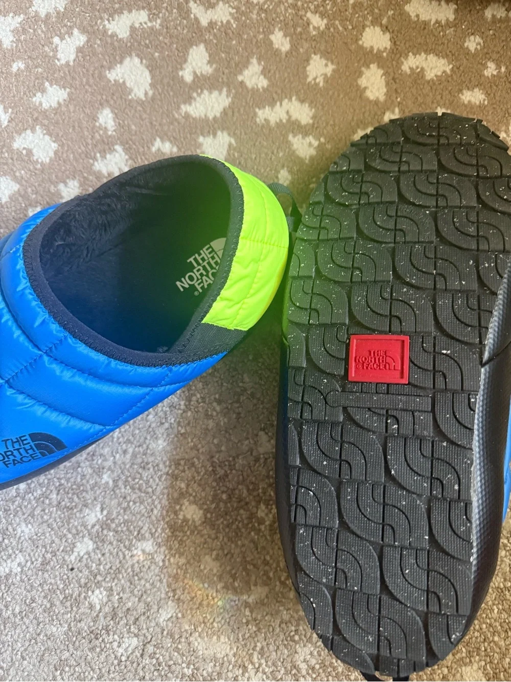 The North Face Men’s Blue and Neon yellow and black Slip-On Slippers